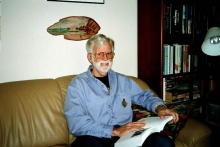 Charles reading in his office